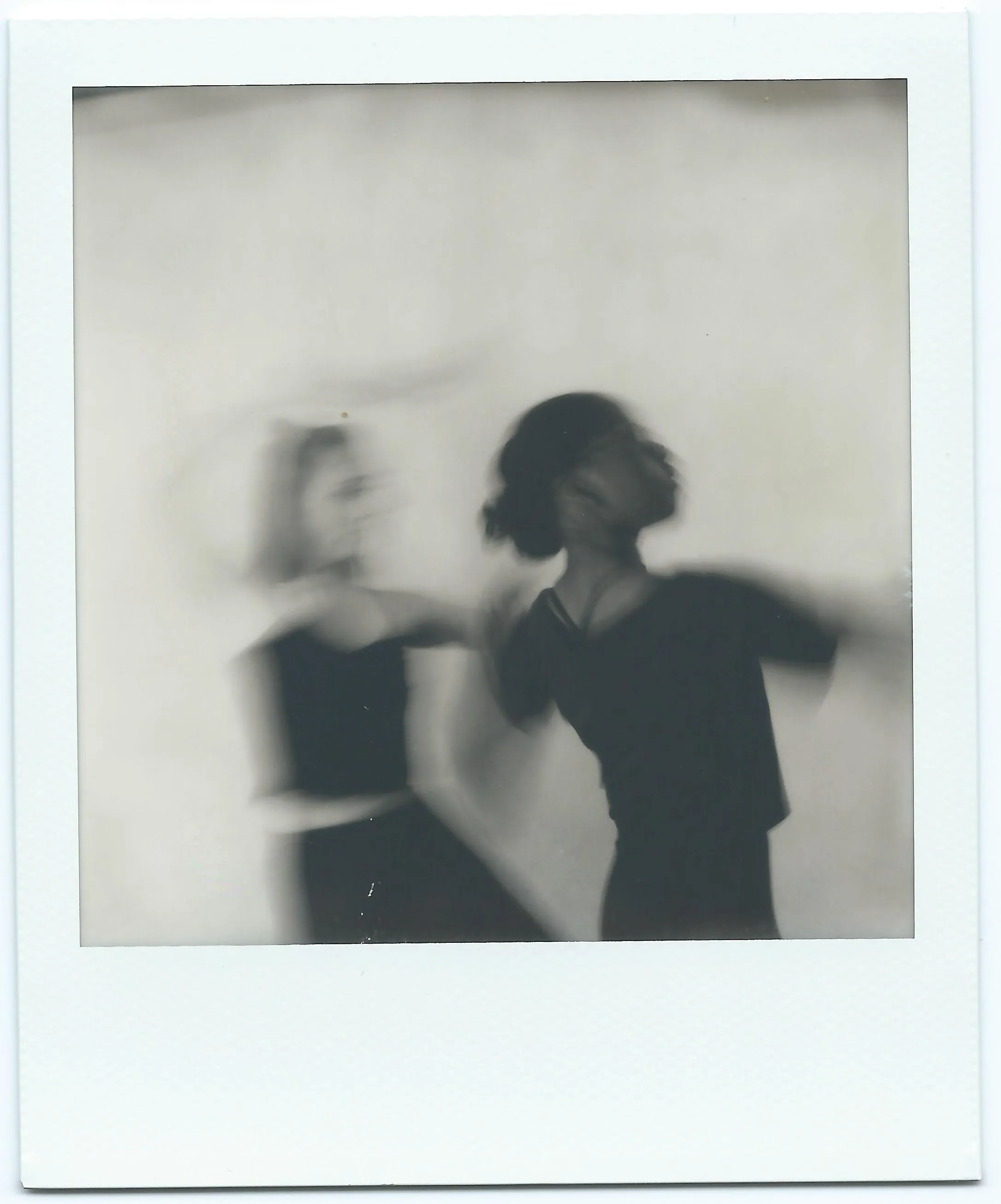 A blurred shot of two dancers giving an impression of motion and rhythm